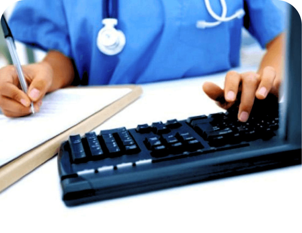 A healthcare professional managing consultations on a computer